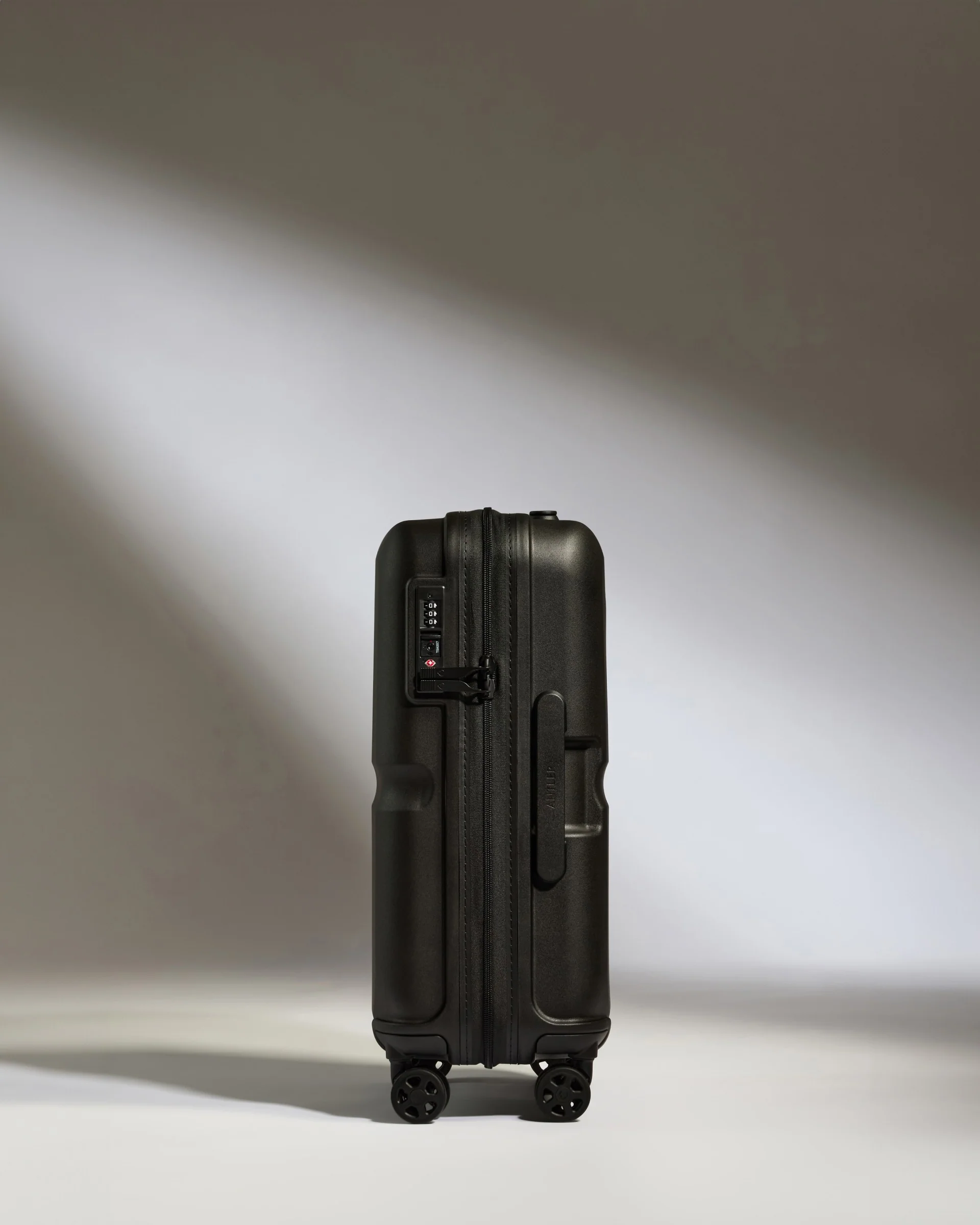 Cabin Suitcase in Black - Single Stripe - Image 4