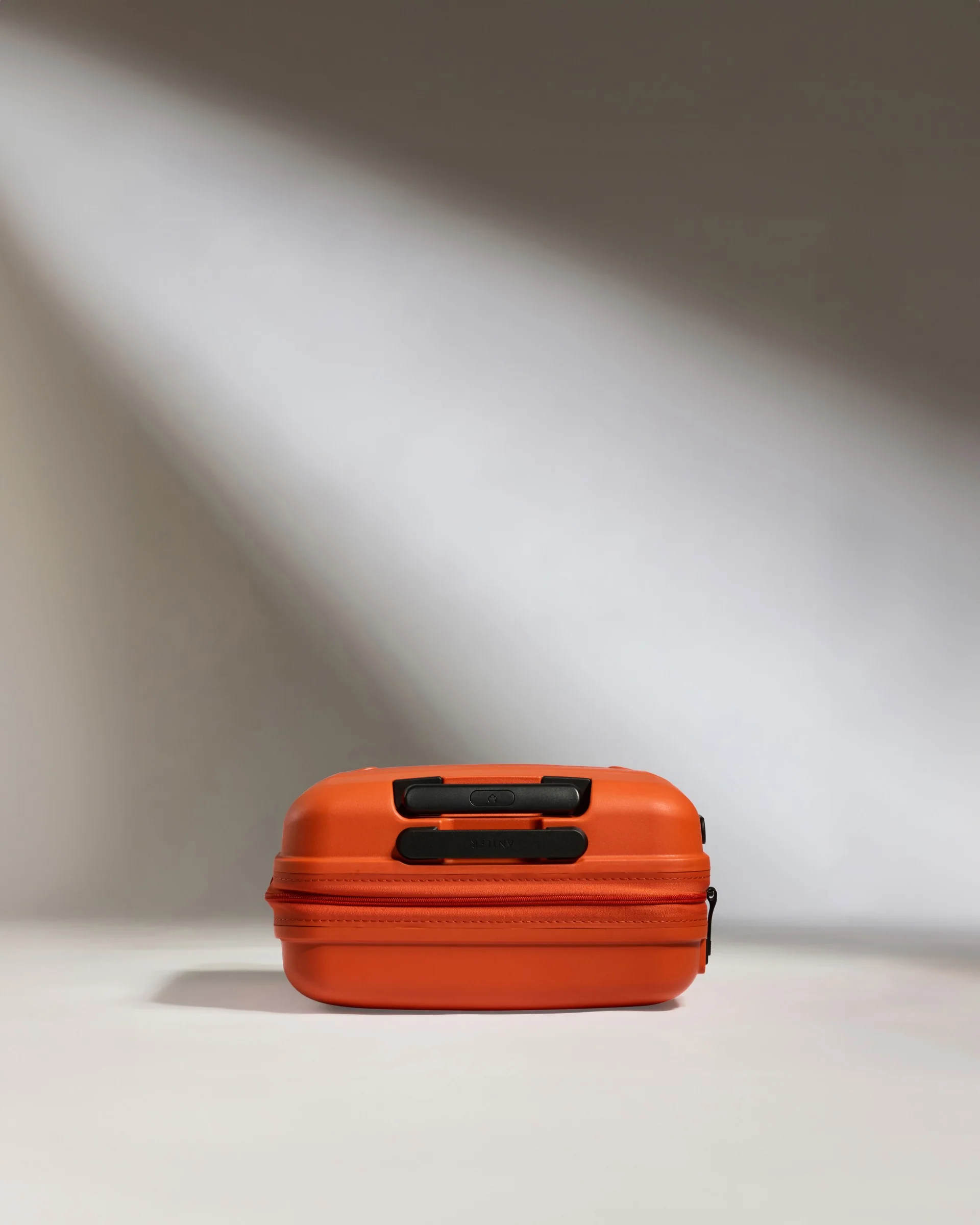 Cabin Suitcase in Ember Orange - Single Stripe - Image 5