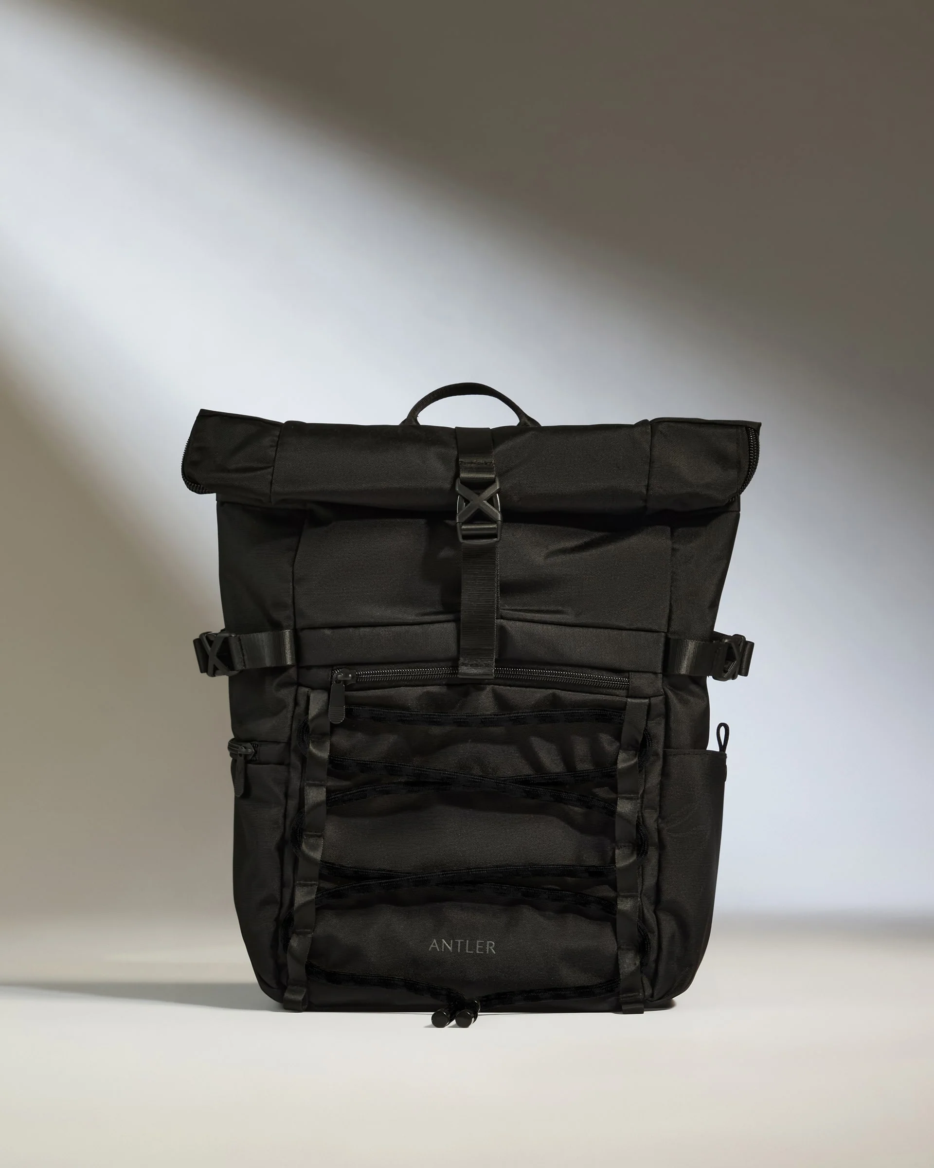 Discovery Roll Top Backpack in Black - Image 5