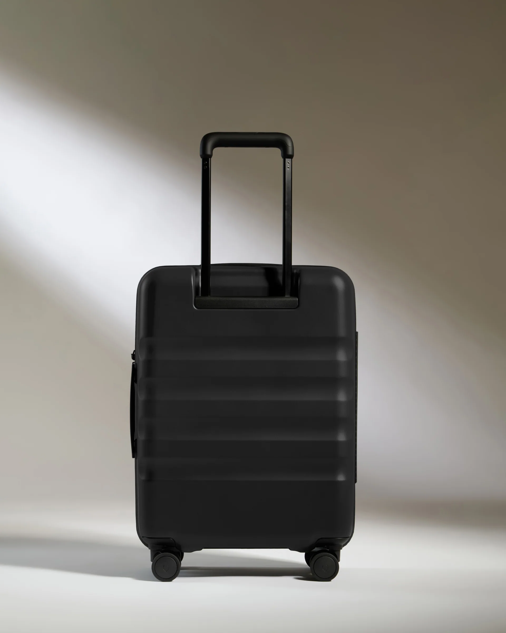 Cabin Suitcase in Black - Icon Stripe - Image 6