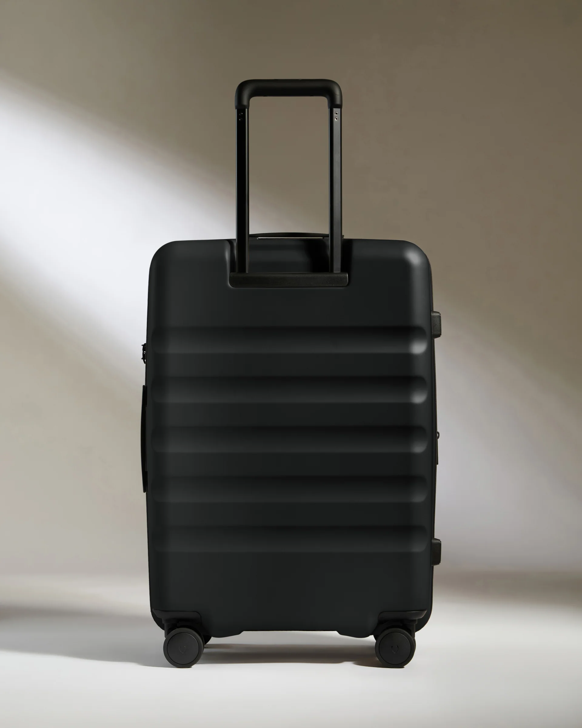 Medium Suitcase in Black - Icon Stripe - Image 6